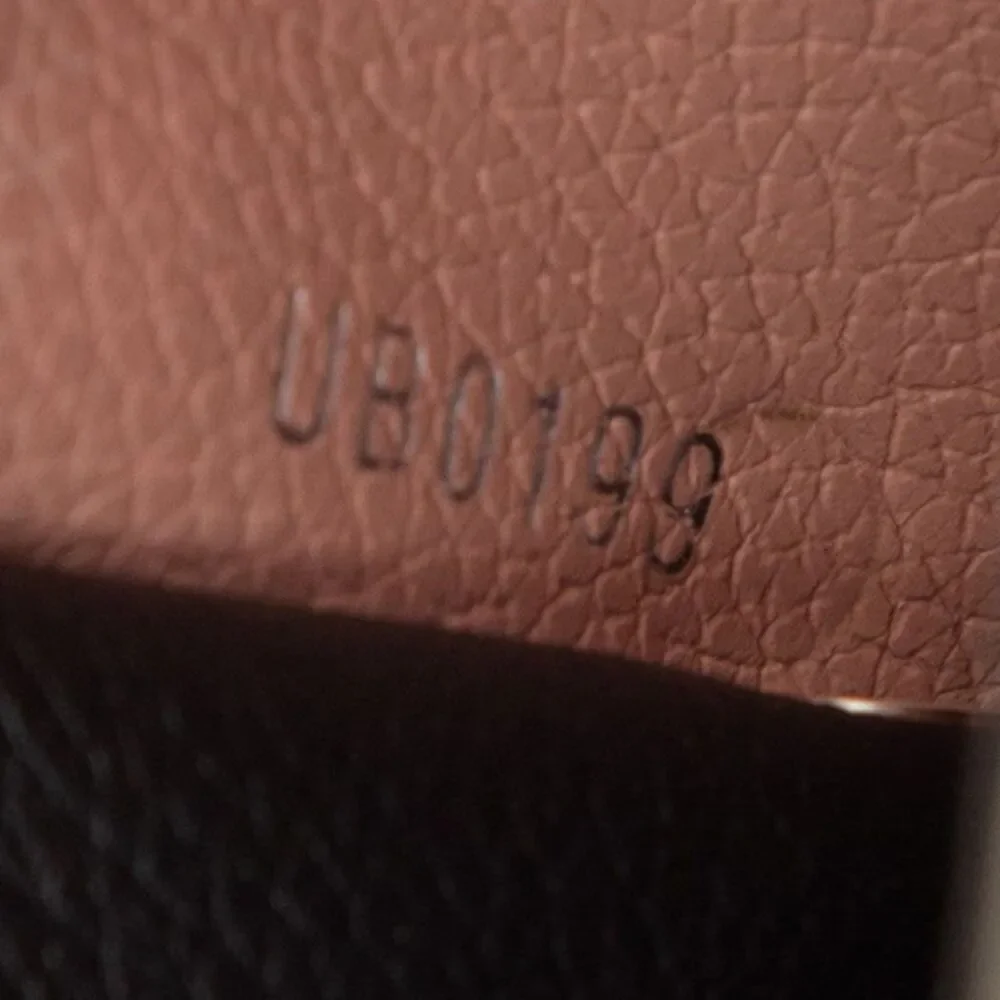 Louis Vuitton Portefeuille Lock Mini Trifold Wallet